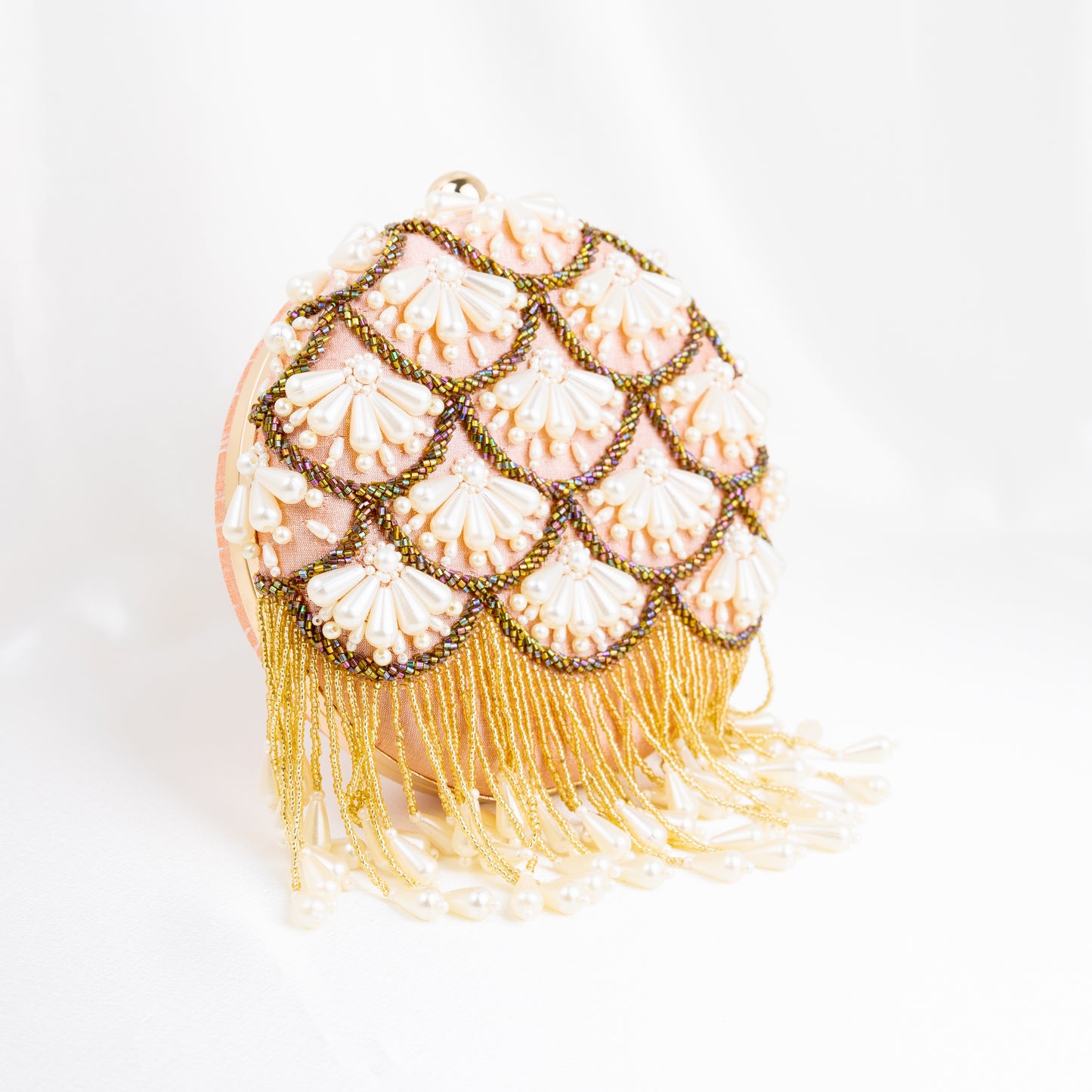 Pearl Elegance: Peach Round Clutch with Golden Embroidery and Lustrous Pearls