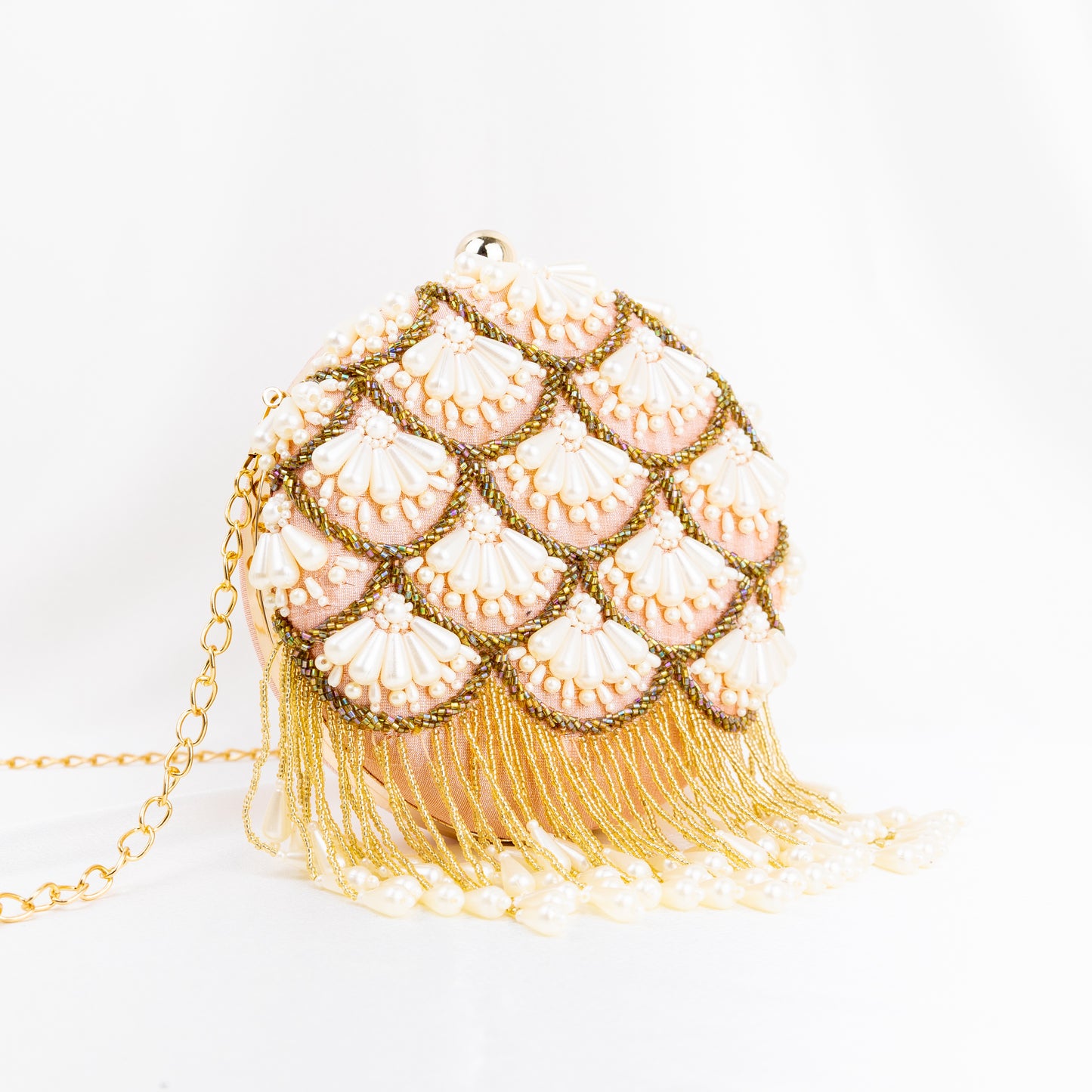 Pearl Elegance: Peach Round Clutch with Golden Embroidery and Lustrous Pearls